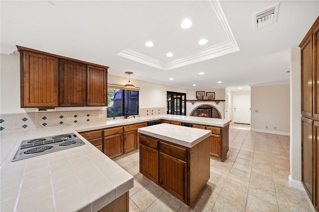 kitchen with decorative backsplash, visible vents, a peninsula, stainless steel electric cooktop, and recessed lighting