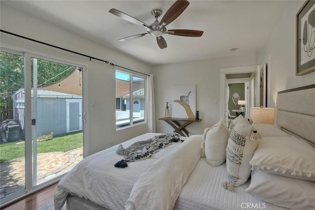 2019 Meade Ave, San Diego, CA 92116 - bedroom with access to outside, wood finished floors, and a ceiling fan