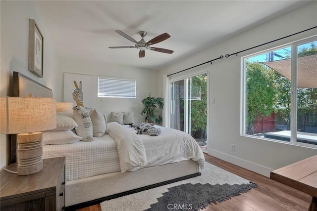 2019 Meade Ave, San Diego, CA 92116 - bedroom with access to outside, baseboards, wood finished floors, and a ceiling fan