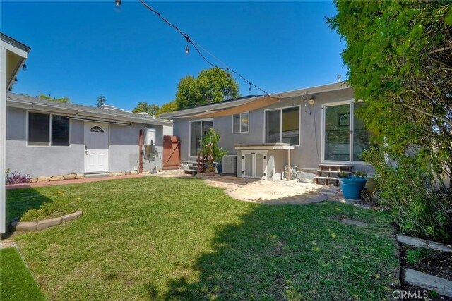 2019 Meade Ave, San Diego, CA 92116 - back of house featuring entry steps, stucco siding, and cooling unit