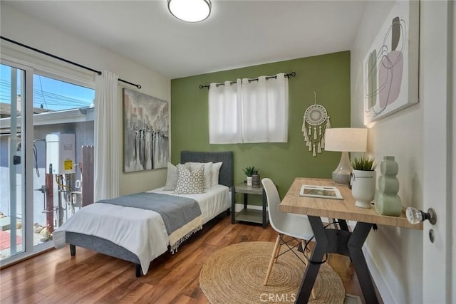 2019 Meade Ave, San Diego, CA 92116 - bedroom featuring wood finished floors, access to exterior, and an office area