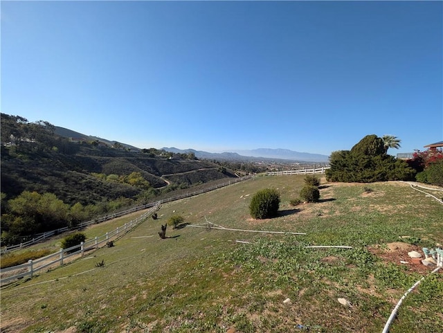 view of mountain feature with a rural view
