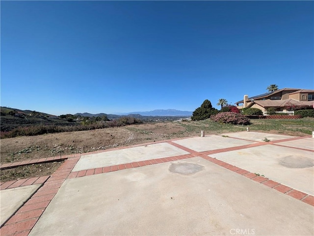 view of patio with a mountain view