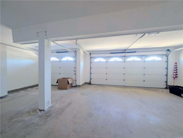 garage featuring baseboards
