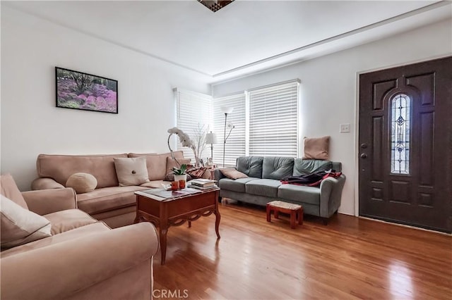 living room with wood finished floors