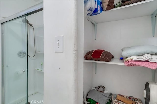 full bathroom featuring a shower stall
