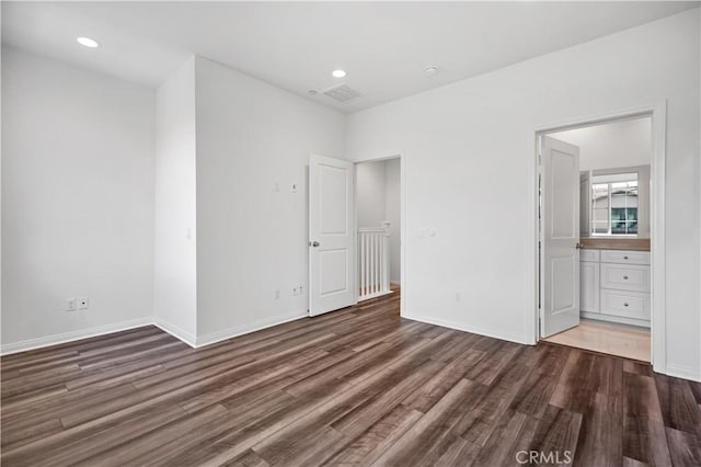 6991 Cottonwood Ln, Buena Park, CA 90621 - unfurnished bedroom with wood finished floors, recessed lighting, and ensuite bathroom
