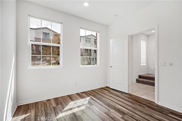 6991 Cottonwood Ln, Buena Park, CA 90621 - empty room featuring wood finished floors, stairway, and recessed lighting