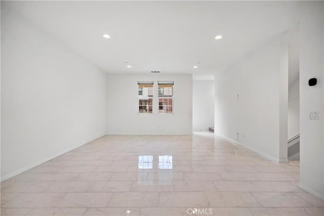 6991 Cottonwood Ln, Buena Park, CA 90621 - empty room featuring recessed lighting and light marble finish floors