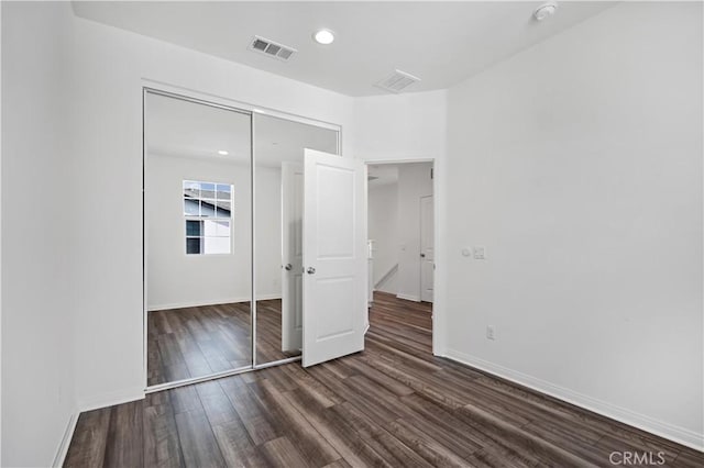 6991 Cottonwood Ln, Buena Park, CA 90621 - unfurnished bedroom with wood finished floors, a closet, and recessed lighting
