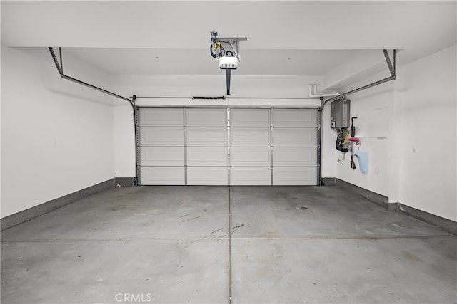 6991 Cottonwood Ln, Buena Park, CA 90621 - garage with water heater and a garage door opener