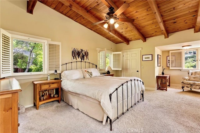 bedroom with baseboards, multiple windows, carpet flooring, and wooden ceiling