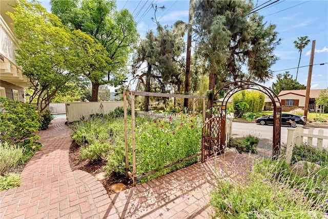 view of yard featuring a gate and fence