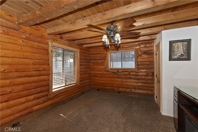 2424 Spruce Dr, Running Springs, CA 92382 - unfurnished dining area with dark carpet, ceiling fan, wood ceiling with exposed beams, and log walls