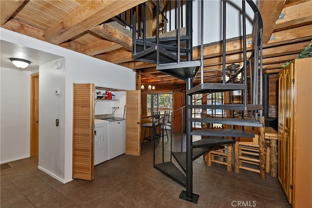 2424 Spruce Dr, Running Springs, CA 92382 - wine room with washer and clothes dryer, dark tile patterned floors, and beam ceiling