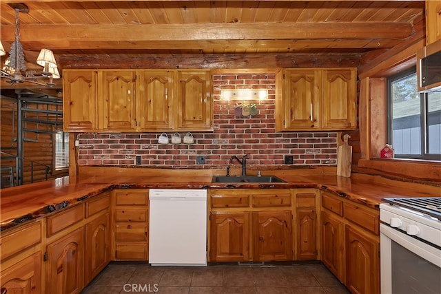 2424 Spruce Dr, Running Springs, CA 92382 - kitchen featuring white appliances, a sink, wood ceiling with exposed beams, dark tile patterned floors, and brown cabinets
