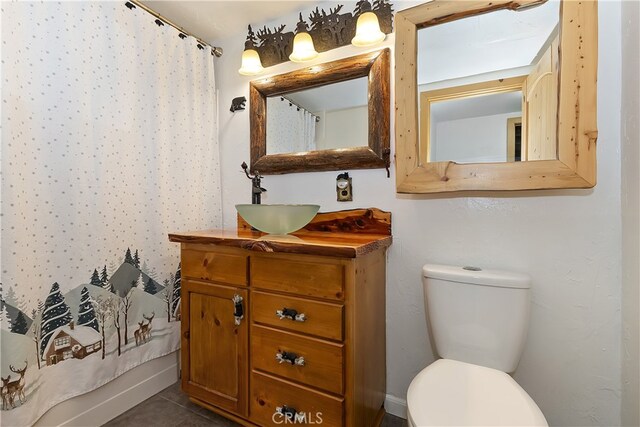 2424 Spruce Dr, Running Springs, CA 92382 - full bathroom with vanity and toilet