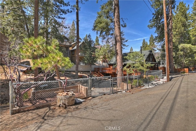 2424 Spruce Dr, Running Springs, CA 92382 - view of front facade with a gate