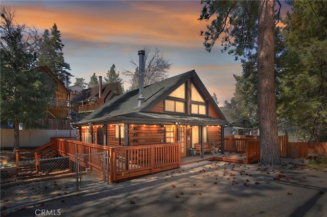2424 Spruce Dr, Running Springs, CA 92382 - rear view of property with a deck