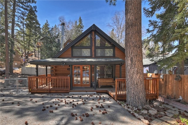 2424 Spruce Dr, Running Springs, CA 92382 - rear view of property featuring a wooden deck and french doors