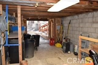 2424 Spruce Dr, Running Springs, CA 92382 - basement featuring concrete block wall