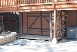 2424 Spruce Dr, Running Springs, CA 92382 - gate featuring a deck and central AC unit
