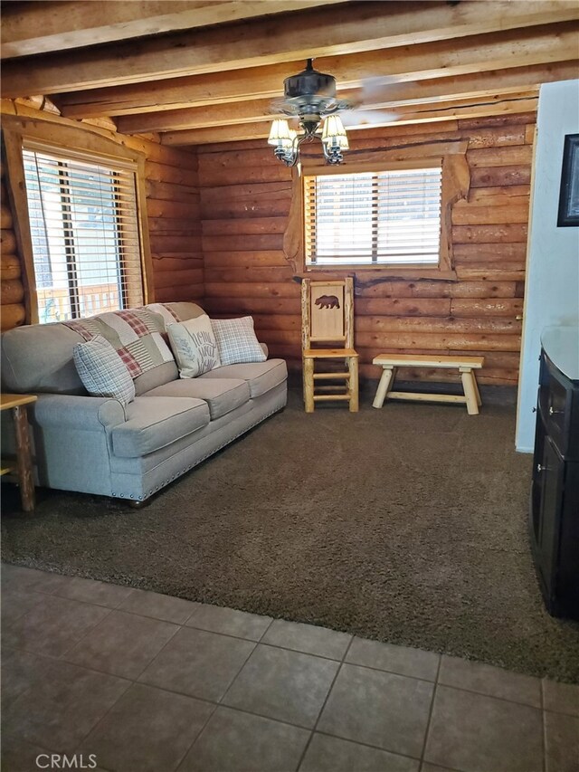 2424 Spruce Dr, Running Springs, CA 92382 - carpeted living area with log walls, healthy amount of natural light, and tile patterned floors
