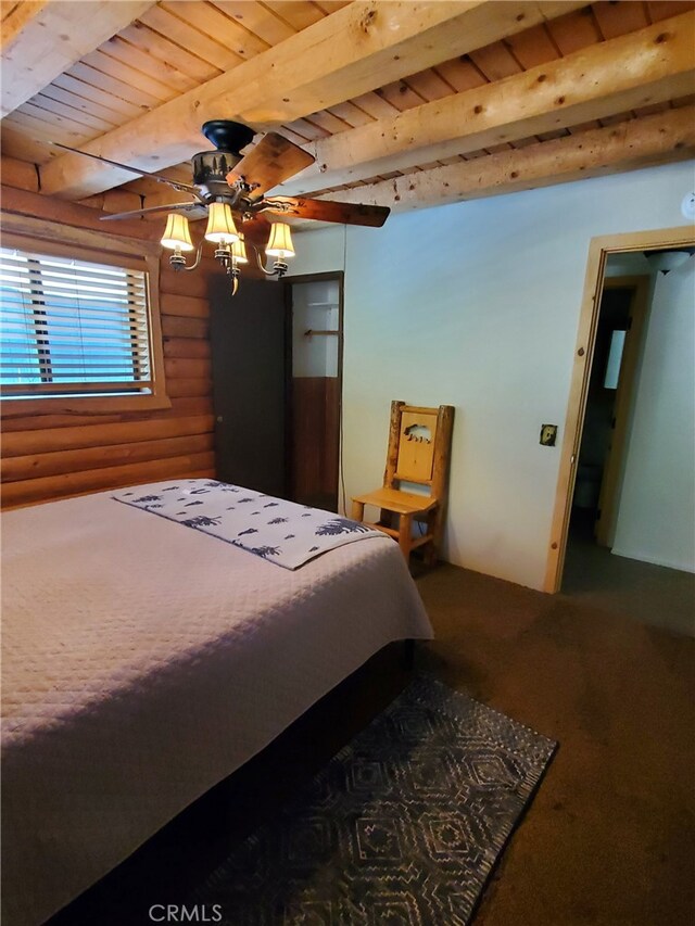 2424 Spruce Dr, Running Springs, CA 92382 - bedroom with log walls, a wood ceiling with exposed beams, and carpet flooring
