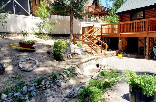 2424 Spruce Dr, Running Springs, CA 92382 - view of yard with a deck and stairway