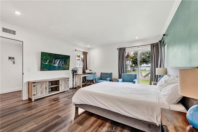 bedroom featuring crown molding, wood finished floors, visible vents, and recessed lighting