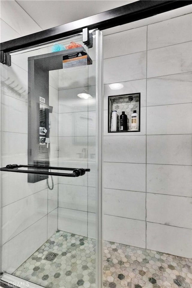 bathroom with a stall shower