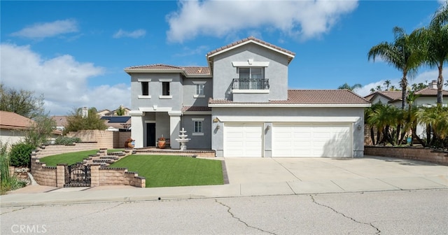27798 Tate Rd, Menifee, CA 92585 - mediterranean / spanish-style house featuring stucco siding, driveway, and a tiled roof