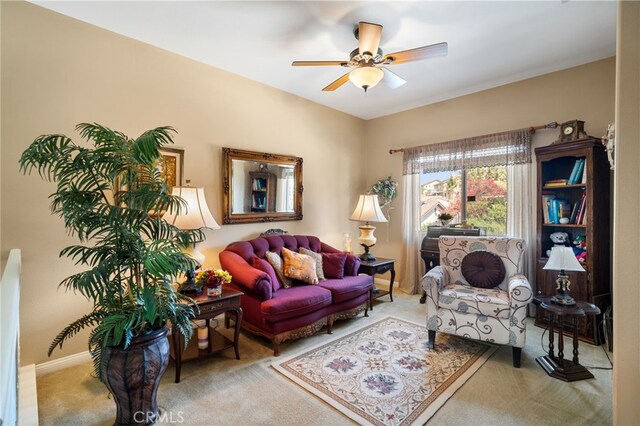 27798 Tate Rd, Menifee, CA 92585 - carpeted living room with baseboards and a ceiling fan