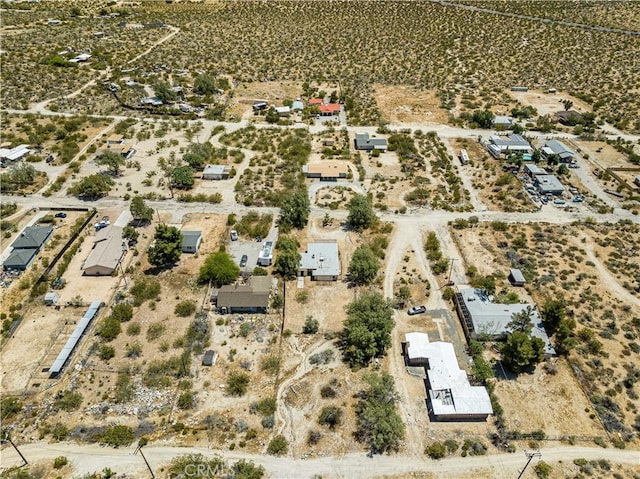 aerial view with view of desert and a rural view