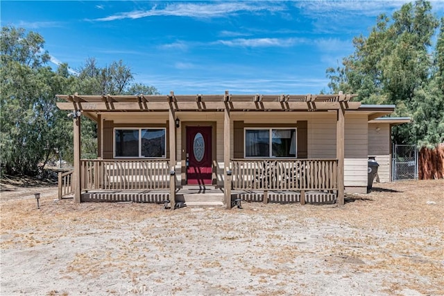 view of front of home with a gate