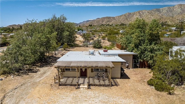 exterior space with a mountain view