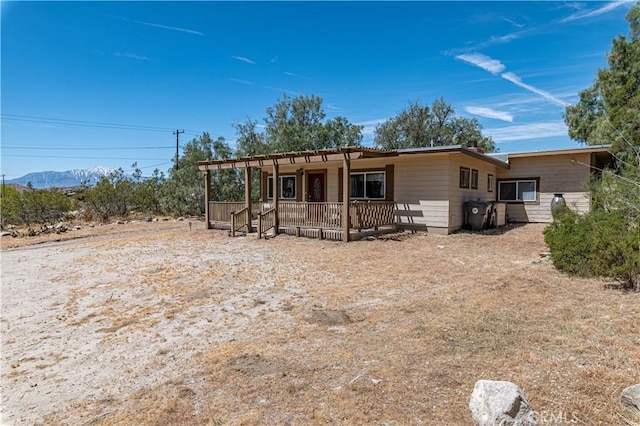 exterior space featuring a mountain view