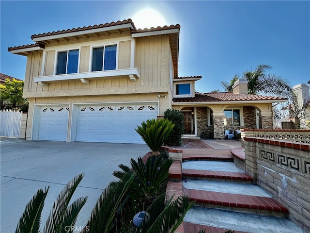 1971 Via Tranquilo, Rowland Heights, CA 91748 - view of front facade with a garage, a tile roof, driveway, fence, and a chimney