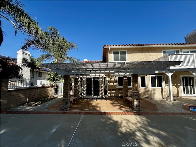 1971 Via Tranquilo, Rowland Heights, CA 91748 - rear view of property featuring stucco siding, a pergola, fence, and a tile roof