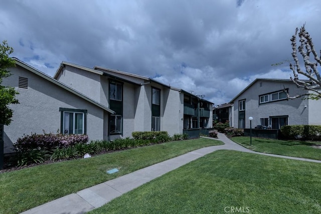 23222 Orange Ave Unit 4, Lake Forest, CA 92630 - view of home's community with a lawn