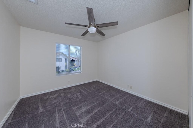 23222 Orange Ave Unit 4, Lake Forest, CA 92630 - unfurnished room featuring a textured ceiling, dark colored carpet, a ceiling fan, and baseboards
