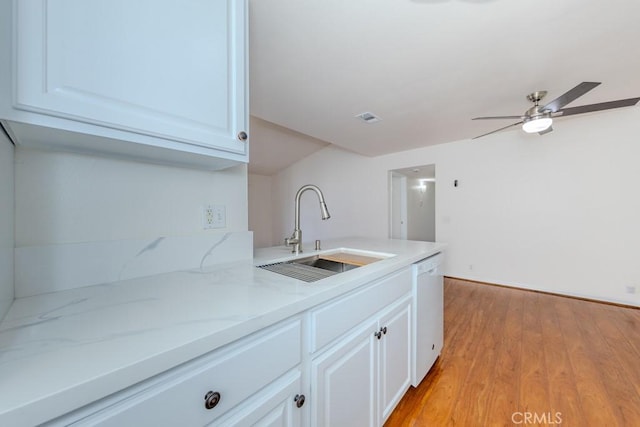 23222 Orange Ave Unit 4, Lake Forest, CA 92630 - kitchen featuring a ceiling fan, white cabinets, light stone counters, dishwasher, and a sink