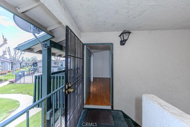 23222 Orange Ave Unit 4, Lake Forest, CA 92630 - doorway to property featuring a residential view, a balcony, and stucco siding
