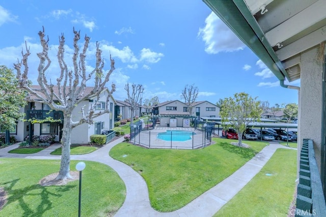 23222 Orange Ave Unit 4, Lake Forest, CA 92630 - pool with a residential view and a lawn
