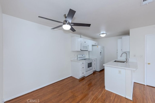 23222 Orange Ave Unit 4, Lake Forest, CA 92630 - kitchen featuring white appliances, light countertops, a sink, and wood finished floors