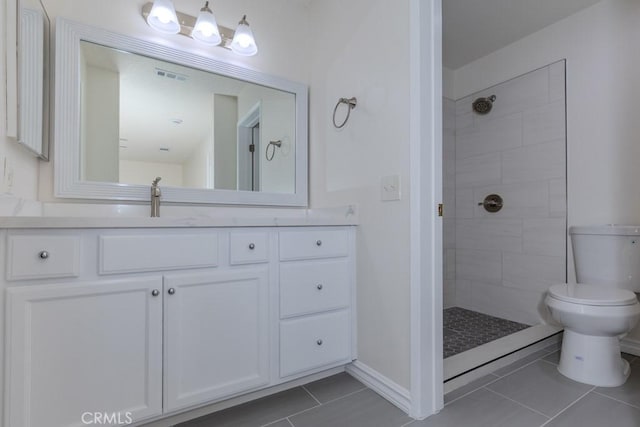 23222 Orange Ave Unit 4, Lake Forest, CA 92630 - bathroom featuring a tile shower, visible vents, toilet, and vanity