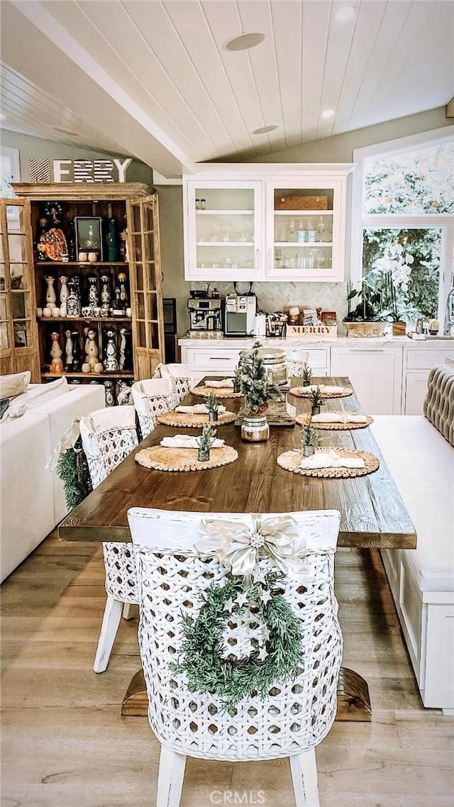 dining room with light wood-style flooring