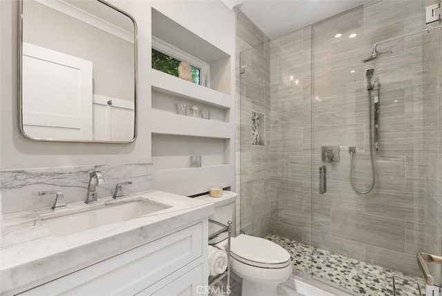 66 S La Senda Dr, Laguna Beach, CA 92651 - bathroom featuring vanity, toilet, and a stall shower