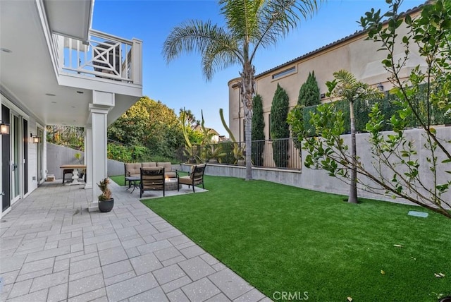 66 S La Senda Dr, Laguna Beach, CA 92651 - view of yard featuring a fenced backyard, an outdoor hangout area, a patio area, and a balcony