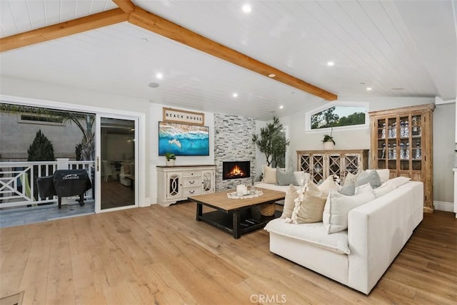 66 S La Senda Dr, Laguna Beach, CA 92651 - living area featuring recessed lighting, lofted ceiling with beams, wood finished floors, and a large fireplace